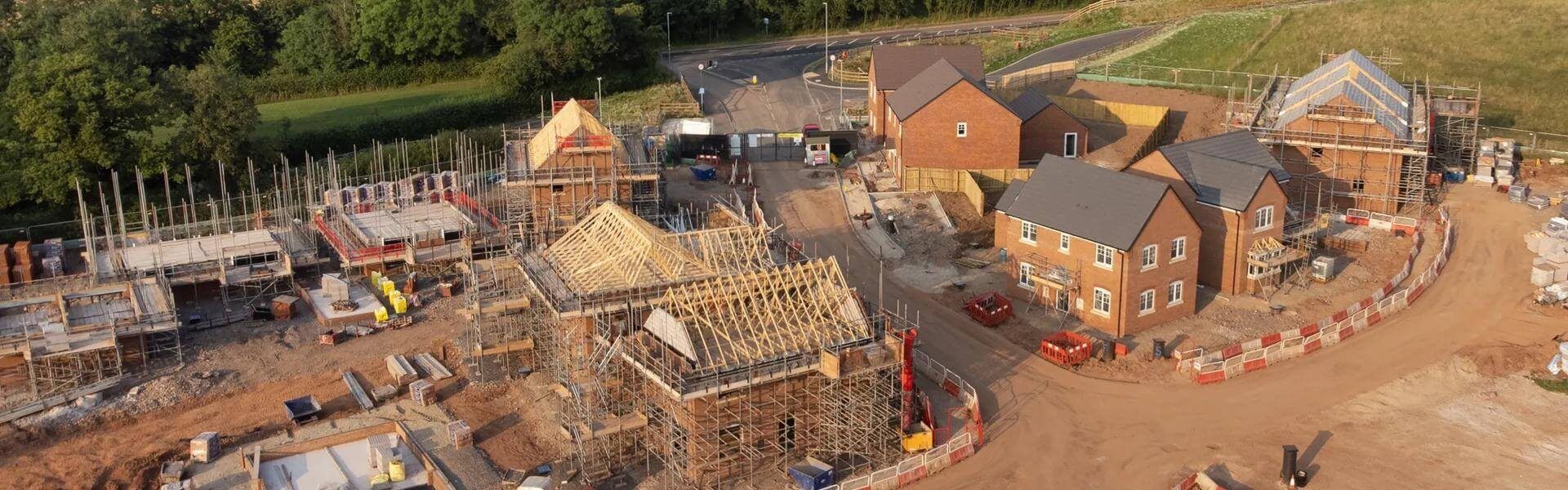Aerial view of new build housing construction site in England, UK